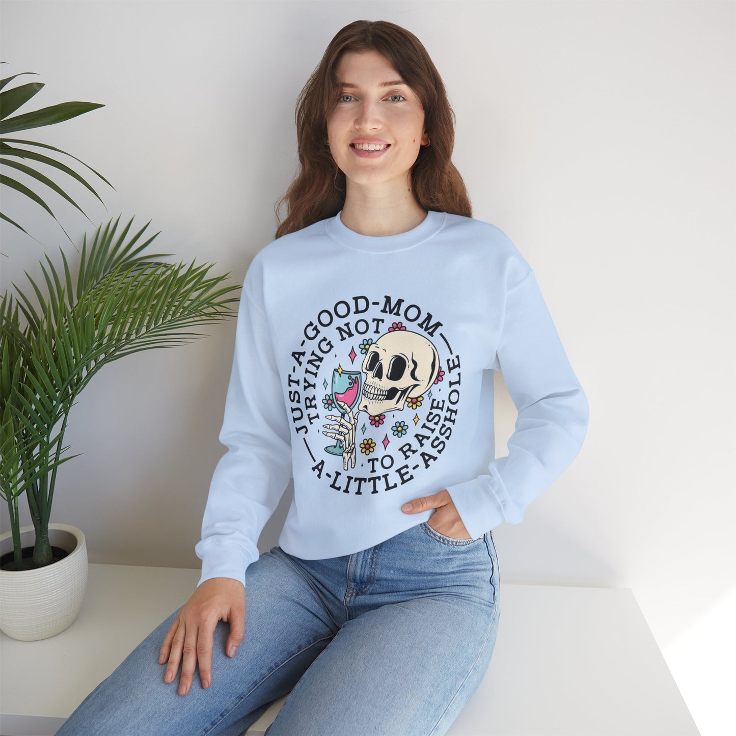 Just a Good Mom Trying Not to Raise a Little Asshole Crewneck Sweatshirt - Funny Skull Design
