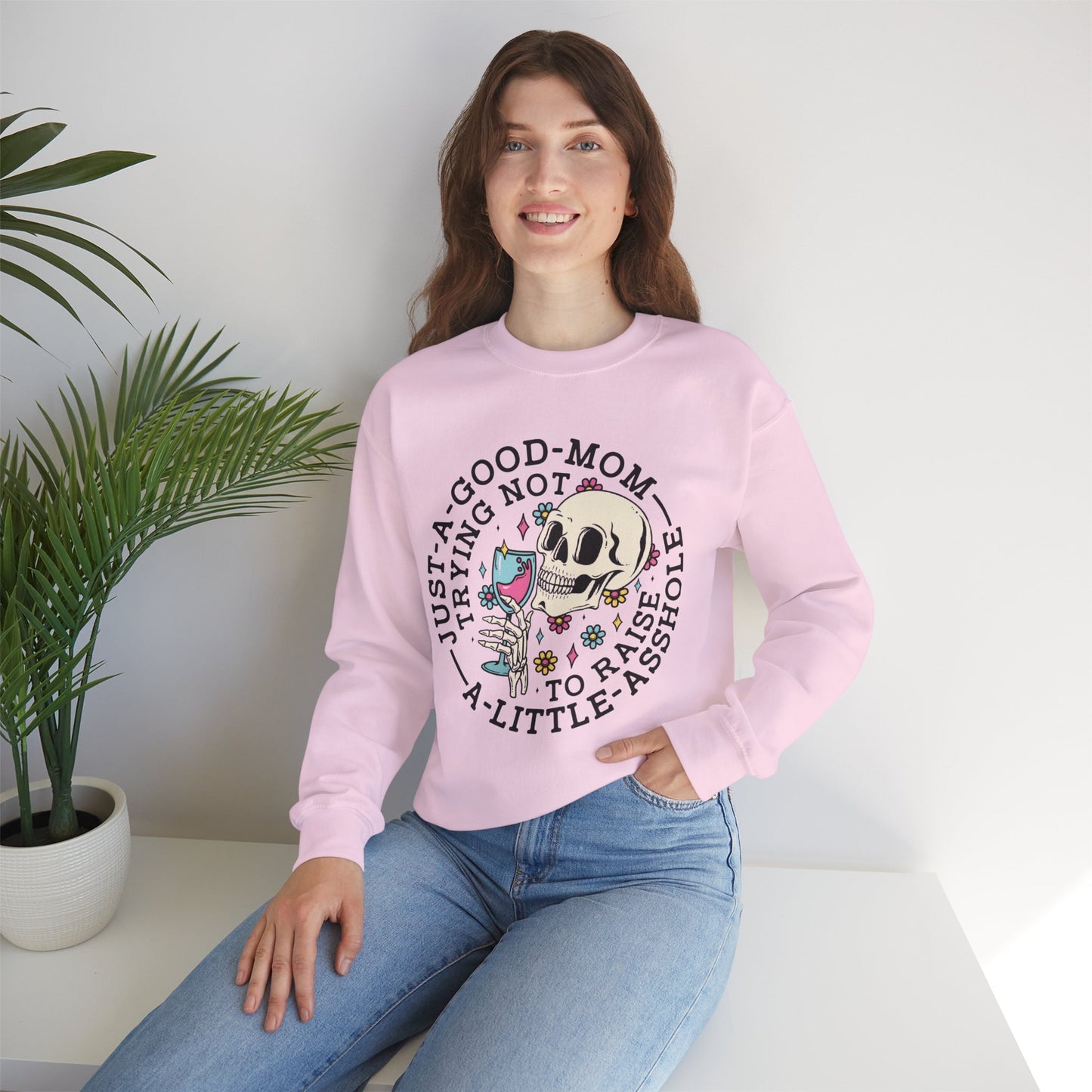 Just a Good Mom Trying Not to Raise a Little Asshole Crewneck Sweatshirt - Funny Skull Design